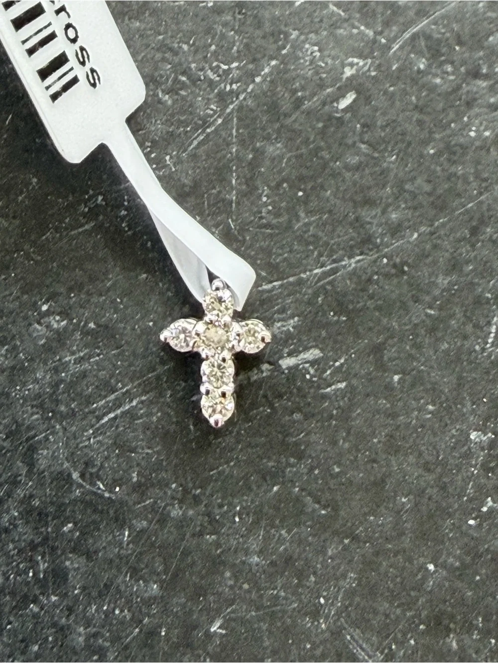 14kt white gold diamond cross .06 carats